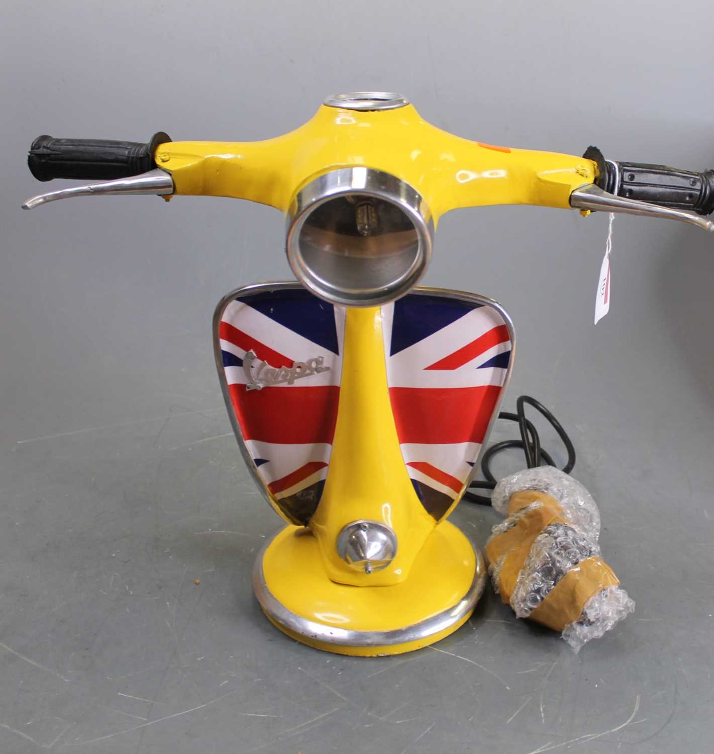 Lot 102 - A modern table lamp in the form of a Vespa...