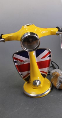 Lot 102 - A modern table lamp in the form of a Vespa...