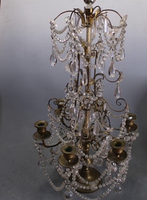 Lot 107 - A pair of Louis XV style six-branch brass and...