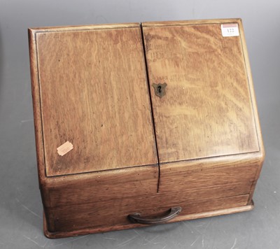 Lot 122 - A late Victorian oak table-top stationery...
