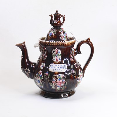Lot 127 - A late Victorian treacle glazed bargeware...
