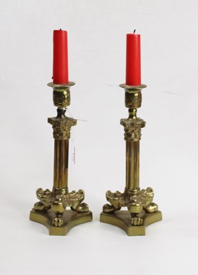 Lot 128 - A pair of French Empire style table...