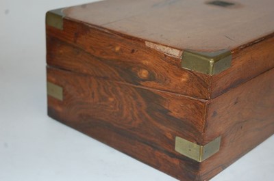 Lot 131 - A Victorian walnut and brass bound writing...