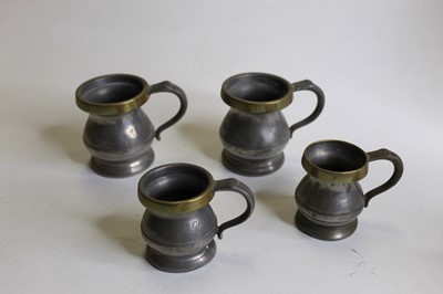 Lot 141 - Seven 19th century pewter measures, each...
