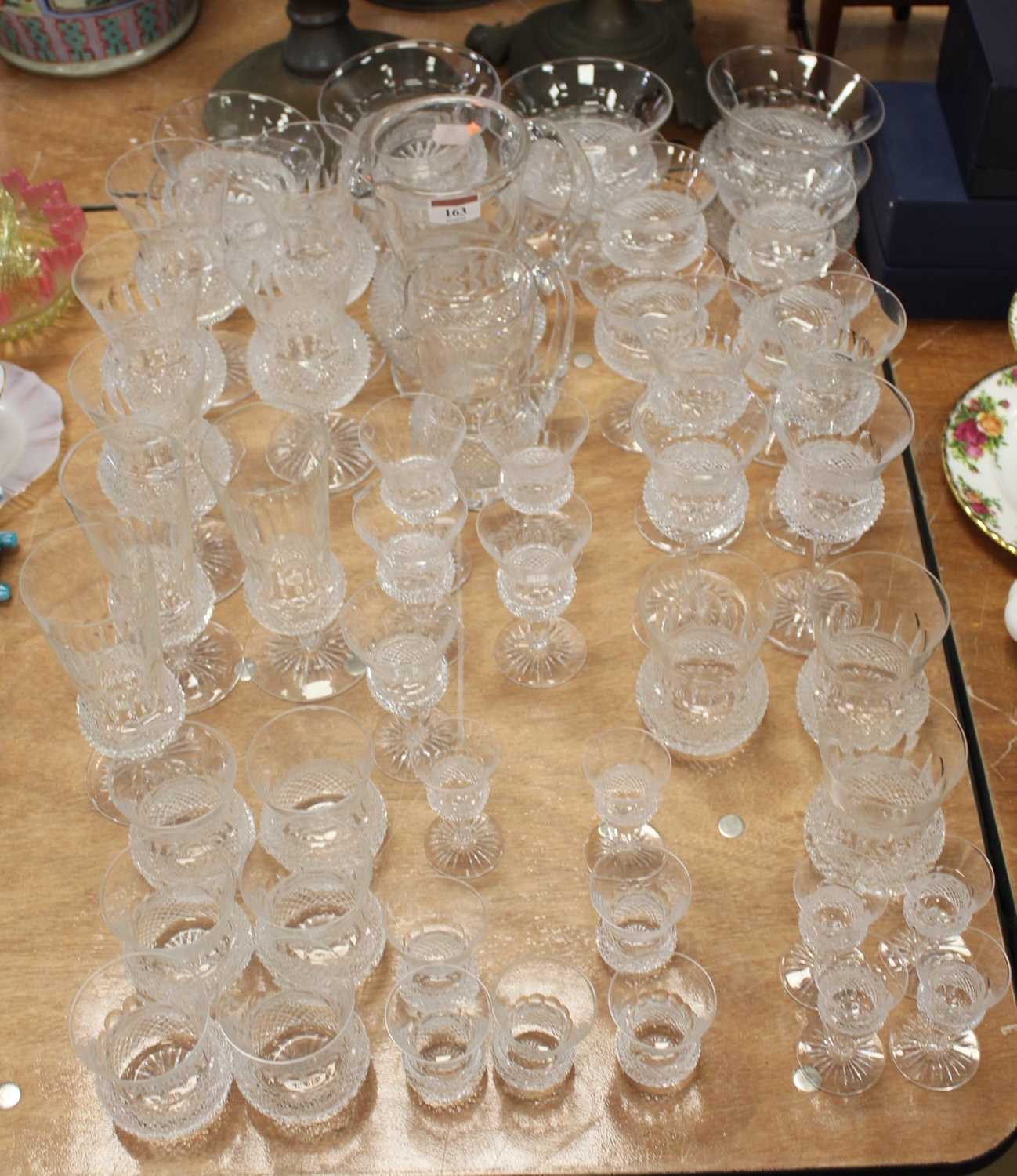 Lot 163 - A matched suite of cut glassware, mostly of...