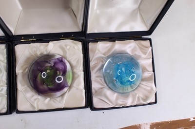Lot 165 - A boxed set of four Caithness glass...