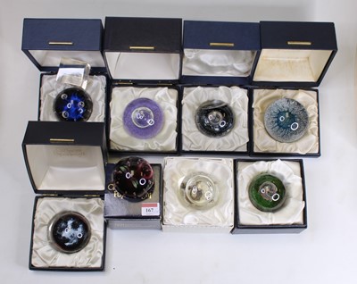 Lot 167 - A collection of seven glass paperweights, to...