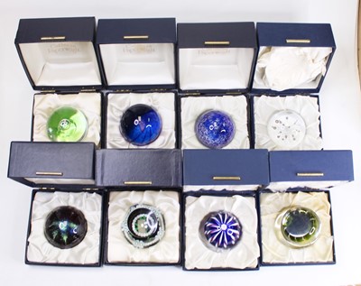 Lot 168 - A collection of eight glass paperweights, to...