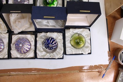Lot 170 - A collection of eight glass paperweights, to...