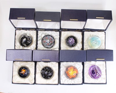 Lot 173 - A collection of eight glass paperweights, to...