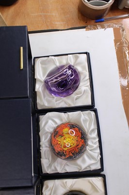 Lot 173 - A collection of eight glass paperweights, to...