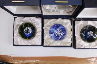 Lot 174 - A collection of eight glass paperweights to...