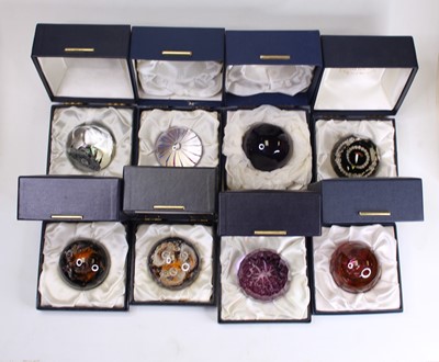 Lot 175 - A collection of eight glass paperweights to...