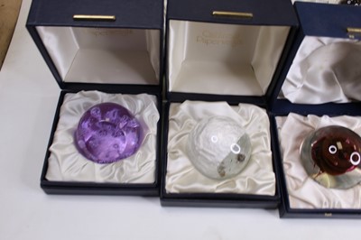 Lot 177 - A collection of eight glass paperweights to...