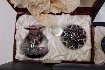 Lot 178 - A collection of eight glass paperweights to...