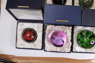 Lot 179 - A collection of eight glass paperweights to...