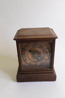 Lot 187 - An early 20th century oak cased mantel clock,...