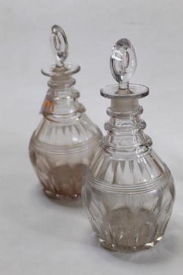 Lot 219 - A pair of Regency triple neck decanters, each...