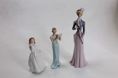 Lot 233 - A Coalport porcelain lady's fashion figure of...