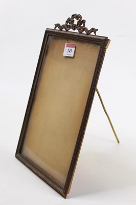 Lot 249 - A circa 1900 brass easel photograph frame, of...