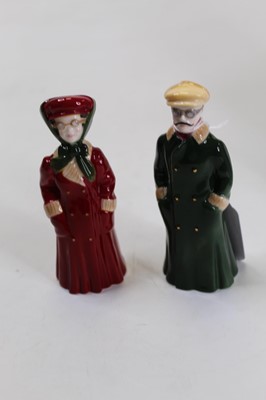 Lot 257 - Two Royal Worcester figural candle snuffers,...