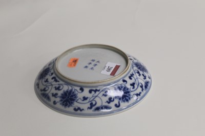 Lot 289 - A Chinese export shallow bowl, the centre...