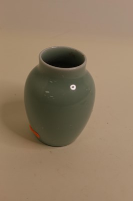Lot 234 - A Chinese export celadon glazed vase of squat...