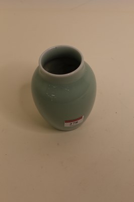 Lot 278 - A Chinese export celadon glazed vase of squat...