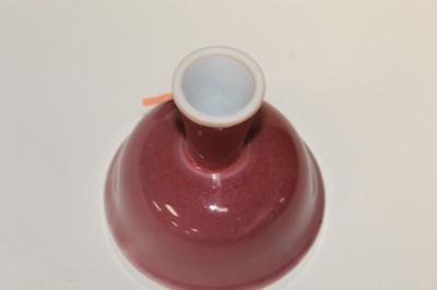 Lot 237 - A Chinese export oxblood glazed stem cup of...