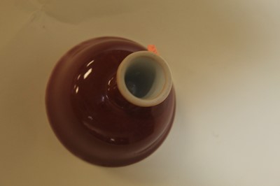 Lot 237 - A Chinese export oxblood glazed stem cup of...