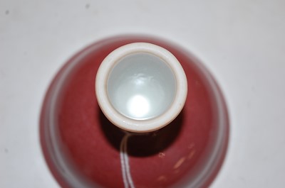 Lot 282 - A Chinese export oxblood glazed stem cup of...