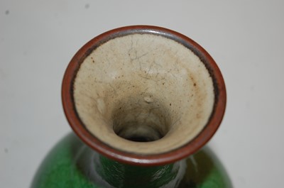 Lot 283 - A green crackle glazed vase having a flared...
