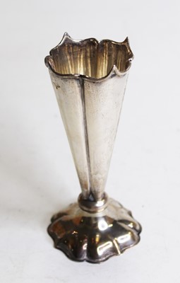 Lot 303 - A George V silver spill vase, of trumpet shape...