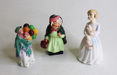 Lot 311 - A collection of three Royal Doulton figurines,...