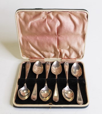 Lot 424 - A set of six George V silver teaspoons in...