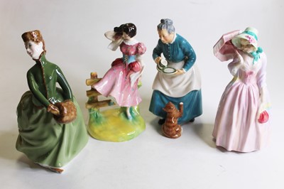 Lot 425 - A collection of four Royal Doulton figurines...