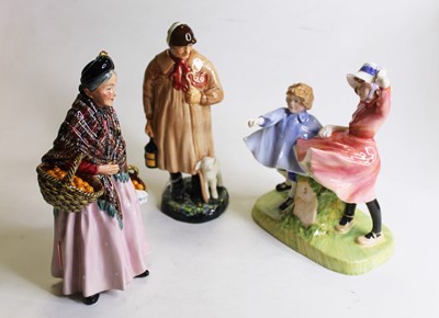 Lot 426 - A collection of three Royal Doulton figurines...