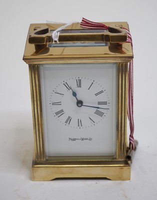 Lot 468 - A lacquered brass cased carriage clock, having...