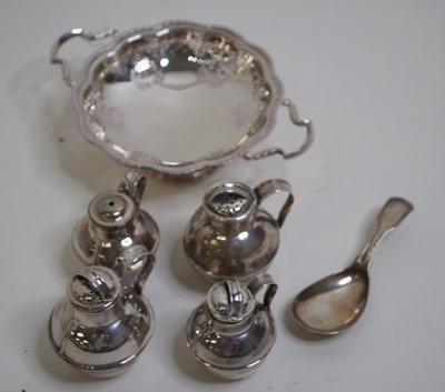 Lot 476 - A silver twin handled bonbon dish of shaped...