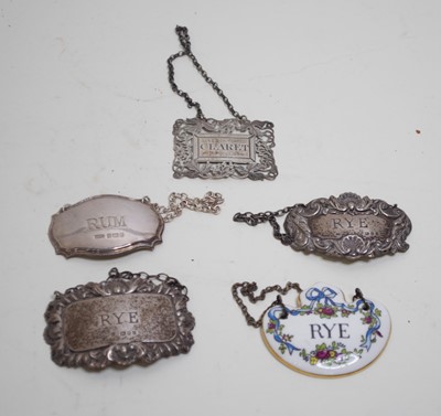 Lot 482 - Two silver decanter collars annotated for Rye,...