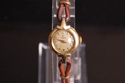 Lot 404 - A lady's yellow metal cased Omega Seamaster...