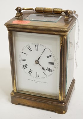 Lot 527 - A lacquered brass cased carriage clock, having...