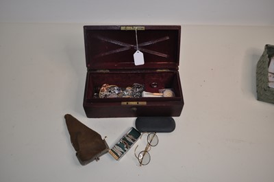 Lot 580 - A leather clad box and contents to include...