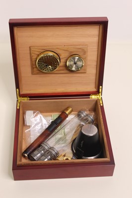 Lot 508 - A modern cigar humidor containing one other...