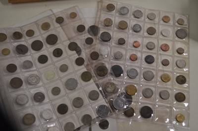 Lot 591 - An album of British & world coins, to include...