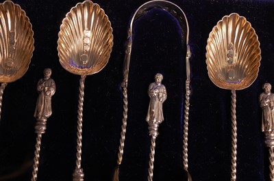 Lot 1050 - A late Victorian cased silver-gilt eight-piece...