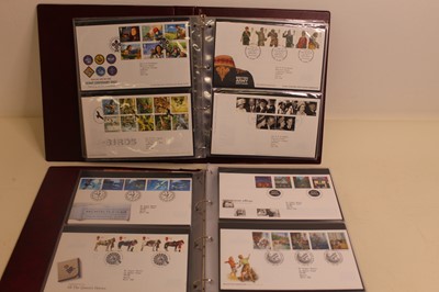 Lot 645 - An album of Royal Mail First Day covers to...