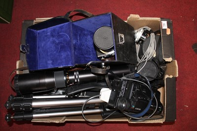 Lot 758 - A box of cameras and related accessories and...