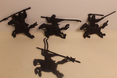 Lot 704 - Four bronzed metal figural plaques of Chinese...