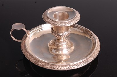 Lot 1045 - A late 19th century French silver chamberstick,...